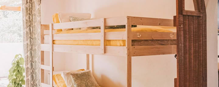 Dormitory (4 bunk beds) and shared bathroom