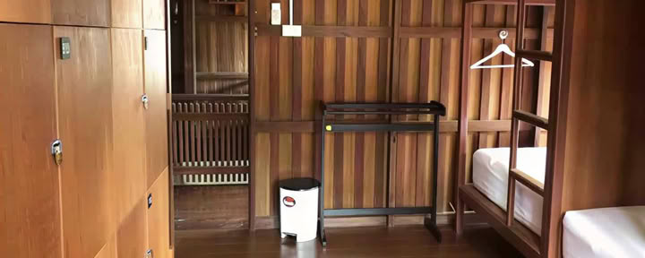 Eenpersoonsbed in hostel met 6 slaapkamers en airconditioning
